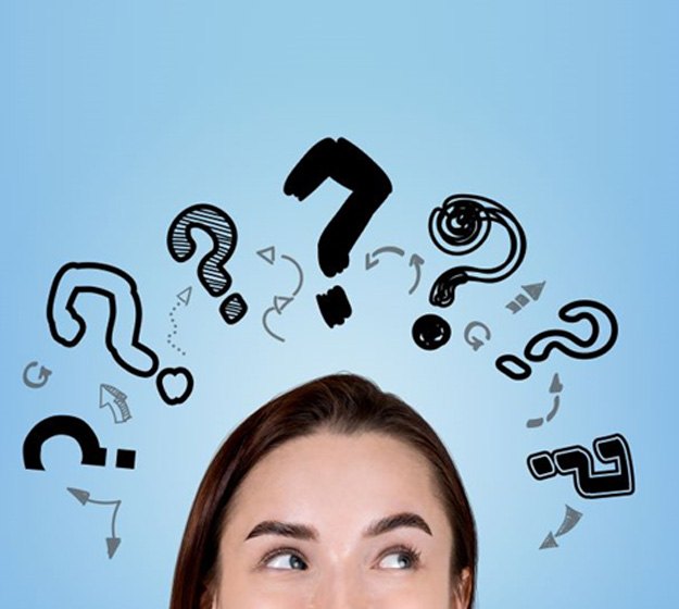 Woman with question marks floating over her head