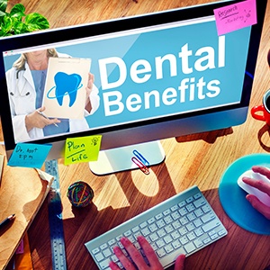 Using computer to look up information about dental benefits