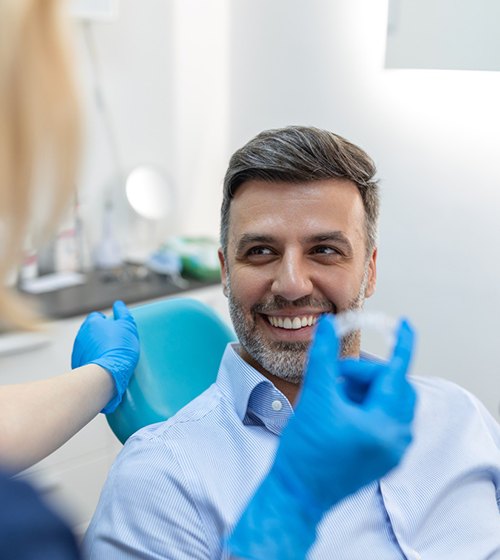 Adult man attending Invisalign appointment