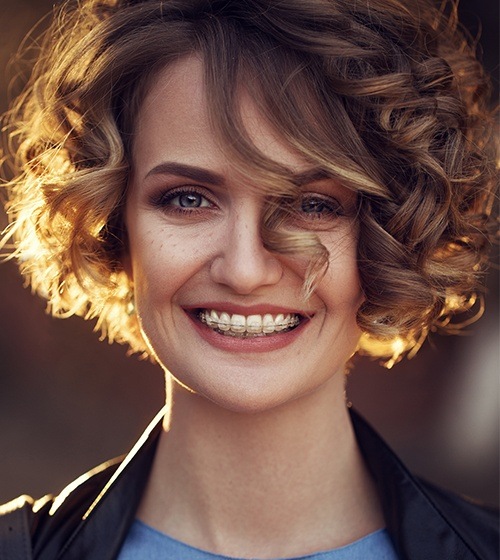 Woman with tooth-colored braces