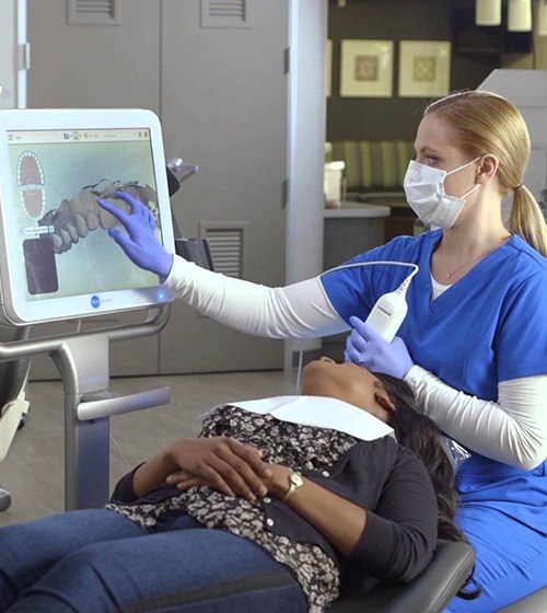 Orthodontist capturing digital impressions