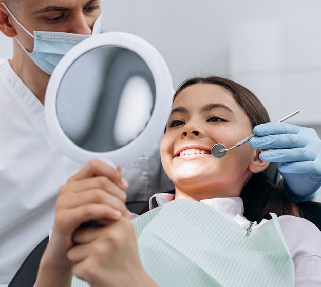 Teen smiling in the dental chair