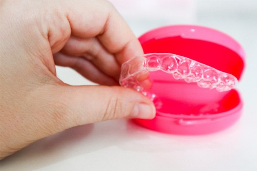 Invisalign in a pink case
