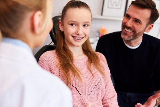Teen smiling at the dentist