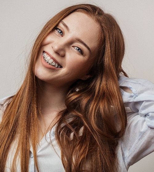 Woman smiling with braces