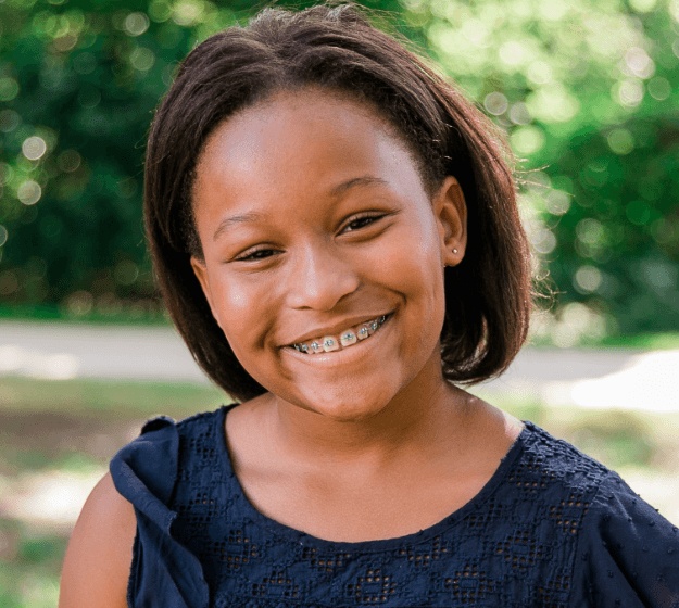 Teen girl with traditional braces