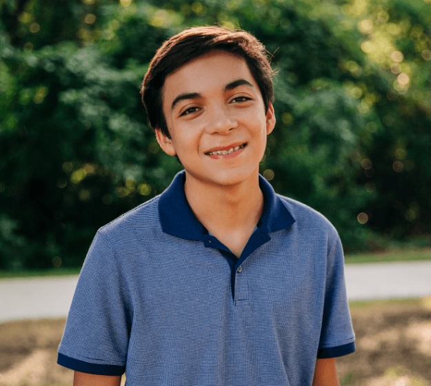 Teen boy with tooth-colored ceramic braces