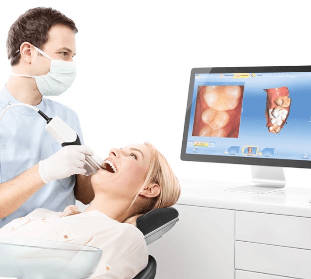 Orthodontist capturing digital bite impressions