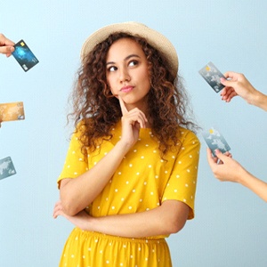 Woman surrounded by credit cards