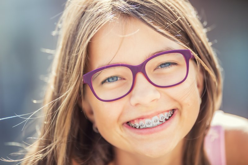 young girl learning braces treatment time in Richardson