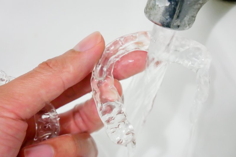 clear aligners and lukewarm water