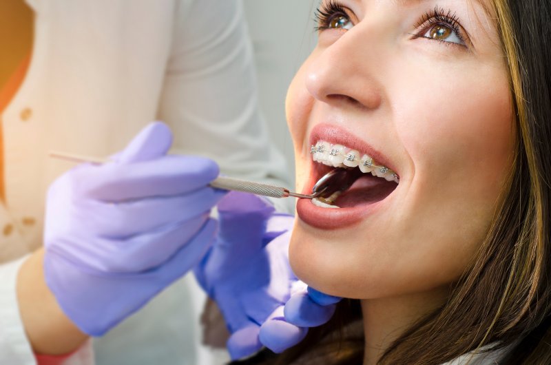 closeup of young woman with braces