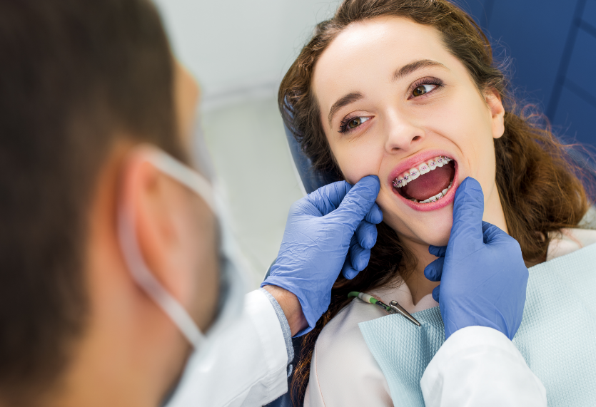 Woman with braces in dental chair