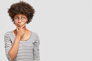 Woman wearing curious, concerned expression